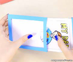 You need to slip the card with the design behind the white paper on the card frame… and the foil on top of the white paper (between white paper and the open part of the frame). How To Make A Diy Father S Day Magic Card Template Included Easy Peasy And Fun