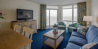 Enjoy two queen beds in a private bedroom, a spacious living area with either a murphy bed or a sleeper sofa, and a full kitchen. Oceanfront 2 Bedroom Double Suite Bay Watch Resort Conference Center