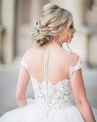 Sheer back button lace mermaid wedding dress with long. 20 Of The Prettiest Wedding Dresses With Buttons Martha Stewart
