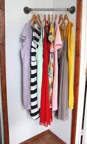 Folding storage wardrobe rack clothes hanging hanger shelf laundry organizer. Corner Bar Closets A Small Space Solution Live Simply By Annie Corner Closet Clothing Rack Garment Racks