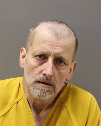 Man charged in knife threats