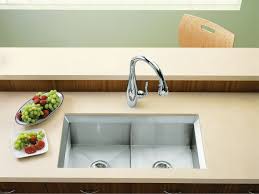 Rear drain increases workspace in the sink and storage space underneath. Standard Plumbing Supply Product Kohler K 3159 Na Poise Undermount Double Bowl Kitchen Sink W