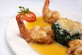 Pork escalopes panfried with garlic, chilli, roast potato and vegetable. Il Mulino New York Restaurant Info And Reservations