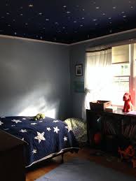 Unfortunately, most of us probably won't get to see space within our lifetimes, but there are plenty of cool space interior décor items that will help us feel like daring astronauts. We Love This Space Themed Bedroom Ideas A Perfect Fun Learning In Form Of Bedroom Decoratio Outer Space Bedroom Outer Space Bedroom Decor Space Themed Bedroom