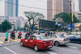 Avoid using the bus during rush hours: Hd Wallpaper Malaysia Kuala Lumpur Petronas Twin Towers Traffic People Wallpaper Flare