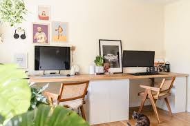 I've always loved this hack so i had to include it in this list of kallax hacks too… if you're looking for a desk where you can both stand & sit then this ikea desk hack will solve your problem… there are so many different ways to organize & store your supplies with the. Our Ikea Desk Hack A Diy Desk For Two By Lisa Linh