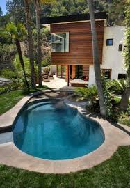 Containers Of Hope A 40 000 Home By Benjamin Garcia Saxe Cool Swimming Pools Swimming Pool Designs Pool Designs