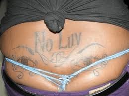 Belly tattoos fall into a gray area. Ugliest Tattoos Tramp Stamp Bad Tattoos Of Horrible Fail Situations That Are Permanent And On Your Body Funny Tattoos Bad Tattoos Horrible Tattoos Tattoo Fail Cheezburger