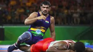 India's kumar sushil wrestles against south africa's jahannes botha during the men's freestyle 74 kg gold medal wrestling match at the 2018 gold. 66gfhfvf6m5qnm