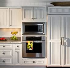 White Wainscoting Kitchen Added To Kitchen Cabinets This Could Be Done Very Easily With Beadboard Kitchen Beadboard Kitchen Cabinets Wainscoting Kitchen