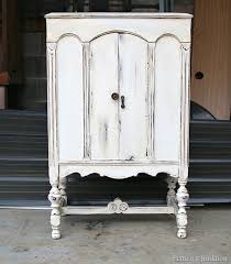 Maybe you would like to learn more about one of these? Antique Finish White Paint Distressed Radio Cabinet Redo Petticoat Junktion