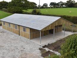 Everything is under one roof and away from the elements, providing you with a sheltered and dry working environment. American Barns Equestrian Barns Design Build Cheval Liberte