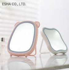 The lighted makeup mirror's 16 dimmable led lights can be adjusted with a touch to the smart button control on the front to put you in the best light. Led Home Desktop Charging Dressing Folding Portable Vanity Mirror China Portable Led Mirror And Led Cosmetic Mirror Price Made In China Com