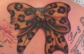 Leopard print shoulder and sleeve Colored Leopard Print Tattoos Cool Tattoos Designs Leopard Print Tattoos Tattoos Pattern Tattoo