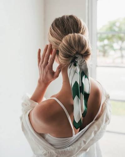 We're obsessed with this low bun hairstyle guest starring our Things Change silk scarf. @laurencbrew . . . . . . Silk scarf look, scarf style, headscarf, chic style, scarf hairstyle, bandana,