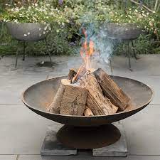 A cast iron fire pit is a perfect way to enjoy the outdoors, especially if you're planning to have a gathering or party in your backyard. Buy Cast Iron Disc Fire Pit Delivery By Crocus