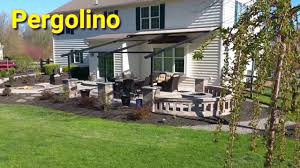 Whether you opt for a gable, pitch, or sail pergola, it not only adds structure to the yard but also provides shade and seclusion. Patio With Fire Pit Pergola Awning Outdoor Living Expert Youtube