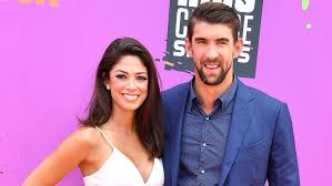 Nicole phelps, wife of olympic swimmer michael phelps, is opening up and sharing her journey as the partner of someone who battles depression and suicidal ideation. Michael Phelps And Wife Nicole Johnson Are Expecting Baby No 3 See The Cute Announcement Entertainment Tonight