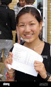 Education alevels half length mid eye contact smiling mangsk hi-res stock  photography and images