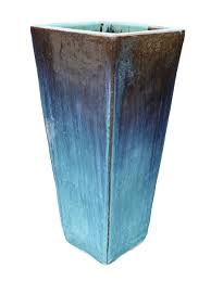 Tall and distinctive, the tapered pot planter is the perfect addition to any front entrance or poolside patio. Tall Wedge Planter Square Planters Black Ceramic Planter Ceramic Flower Pots