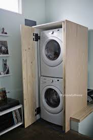 Without a utility room in which to hide the boiler and washer/dryer, the homeowners had to steal space from the kitchen. Washer And Dryer Enclosure Plans Best Placement For Washing Machine