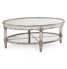 Willow mirrored round coffee table this antiqued mirrored coffee table delights with its bold combination of iron forged metal and a mirrored top. John Richard Kendrick Hollywood Regency Silver Antique Mirror Oval Coffee Table 51 W 60 W Kathy Kuo Home