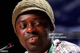 Richard Harpham, team leader of the Ghana alpin ski team addresses... News  Photo