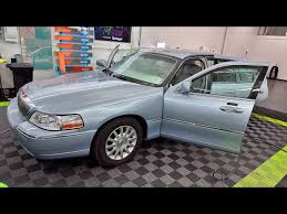 Image result for Light Ice Blue 2006 Town Car