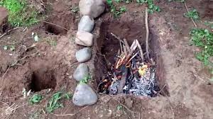 I think you are going to need to pipe a permanent metal pipe then have a pump to get the water out of there. Sas Survival Handbook Dakota Fire Pit Youtube