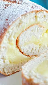 Creamy Lemon Angel Cake Roll A Light Delicious Angel Cake Roll Filled With Creamy Lemon Custard Desserts Cake Roll Cake Roll Recipes