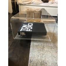 Touch device users, explore by touch or with swipe gestures. Cb2 Acrylic Rolling Coffee Table Aptdeco