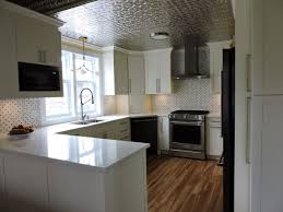 Kitchen millwork this custom kitchen features a custom island (l shape) wrapped around the beam with an overhang, custom made mullion doors decorating the pantry with built in appliances throughout the kitchen with painted white step shaker custom kitchen cabinet doors. Best Custom Kitchen Design Basement And Home Office Design And Remodeling Service In Cambridge Ontario Edit Design Inc