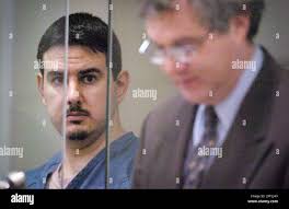 Deniz C. Aydiner, left, accused of murdering University of Portland student  Kate Johnson, looks
