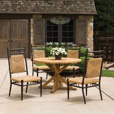 Perfect for your outdoor dinner parties, the table is weather resistant and low maintenance so you can enjoy a sleek, modern look that withstands the test of time. Lloyd Flanders Low Country 5 Piece Woven Vinyl Patio Dining Set Lf Lowcountry Set8