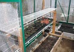 The authors sealed the plywood walls. 21 Greenhouse Shelves Ideas Greenhouse Greenhouse Shelves Diy Greenhouse