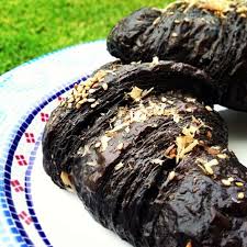 From Pastry Chef Sharon Wang Of Sugar Bloom Bakery Croissants Aux Fruits De Mer Squid Ink Croissant With Roasted Garlic White Sesame And Bonito Flakes