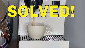 Press the lungo or espresso button once. Nespresso Machine Won T Pump Water Quickest Easiest Fix Youtube