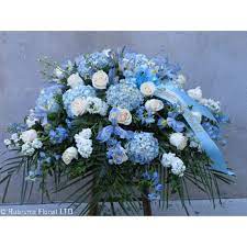 Funeral flowers from interflora, expertly prepared and delivered for free on the next day. Pale Blue White Casket Spray Rubrums Florist Ossining Ny Florist Best Local Flower Shop