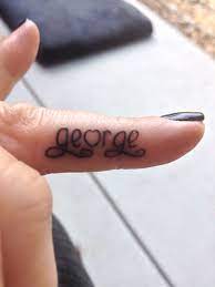 New Finger Tattoo Of My Husbands Name Name Tattoos Tattoos Enough Tattoo
