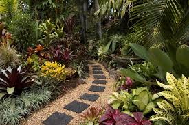 A Tropical Garden Features Tropical Plants And Requires Good Rainfall Or A Decent Irrigation Small Tropical Gardens Tropical Landscaping Tropical Garden Design