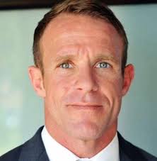 Navy seal edward gallagher at a press event with his wife after being acquitted on the military has launched proceedings to expel commando edward gallagher from the navy seals. Navy Seal Denies Slitting Throat Of 15 Year Old Isis Member In Iraq Before Posing For Photos With Teen S Corpse