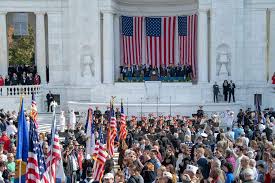 A crowd pays their respects during the Parade of Veteran