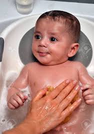 For a full bath, gently wash. Playful Newborn Baby Boy Bathing In The Bathtub Stock Photo Picture And Royalty Free Image Image 62835342