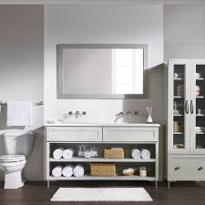 By keeping the walls and the vanity simple and neutral, the designer is able to experiment with the shower and floor tiles and create a load of visual interest with this starburst pattern. Bathroom Design Showroom The Home Depot Design Center