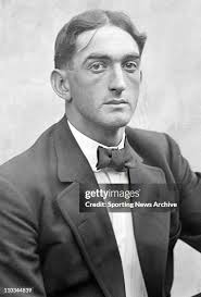 American professional gambler Arnold Rothstein sits at his desk... News  Photo