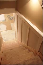 The wide open interior stair with a glass panel rail leads from the top level down to the well insulated basement. Our Basement Staircase Transformation Reveal From Concrete To Colorful