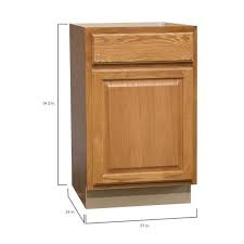 Hampton bay hampton satin white raised panel stock assembled pantry kitchen cabinet (18 in. Hampton Bay Hampton Assembled 21 In X 34 5 In X 24 In Base Kitchen Cabinet With Ball Bearing Drawer Glides In Medium Oak Kb21 Mo The Home Depot