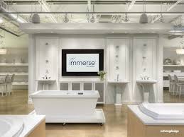 You can also stop by our lincolnwood design showroom, which offers 30,000 square feet of design ideas for you to examine firsthand. Woodwork Behind Pedestal Sinks Immerse Plumbing Showroom By Nehring Design Black And White Tiles Bathroom Glamorous Bathroom Decor Bathroom Interior Design