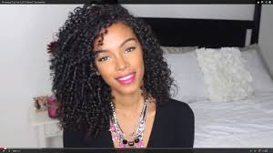 Cheerful and smiley face of lovely,young woman. Sunkissalba On Embracing Her Curls And Big Curly Hair Routine Glamour