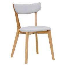 The wood frame adds contrast to the upholstered seat, while ferrules on each leg add metallic touches. Lund Oak Dining Chair Grey Fabric Seat Barker Stonehouse